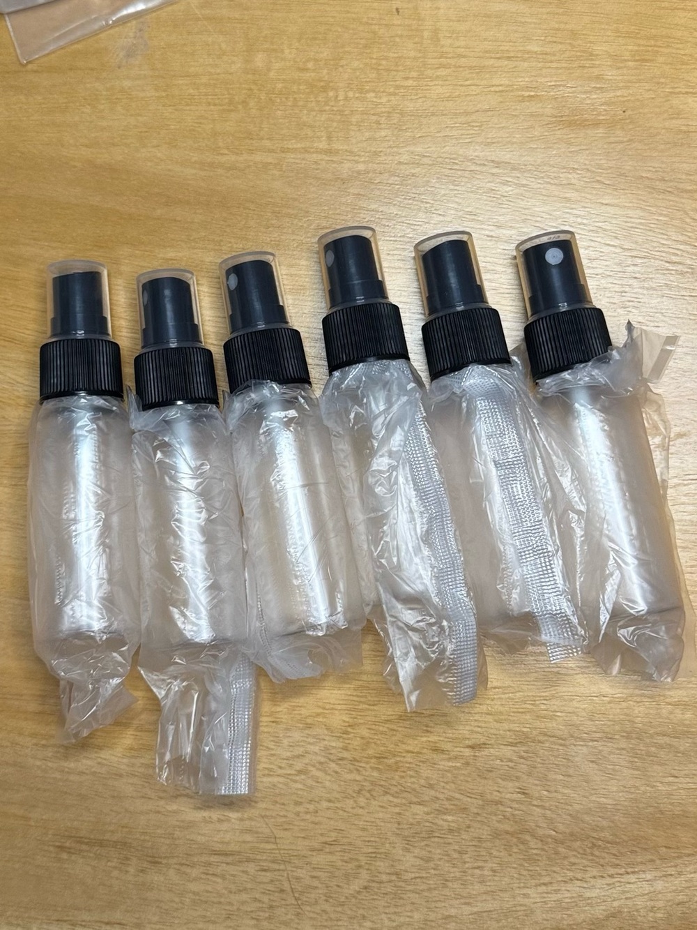 Lot of 6- Universal Clear Travel 1oz Spray Bottles